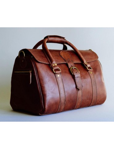 real travel bag in genuine brown leather